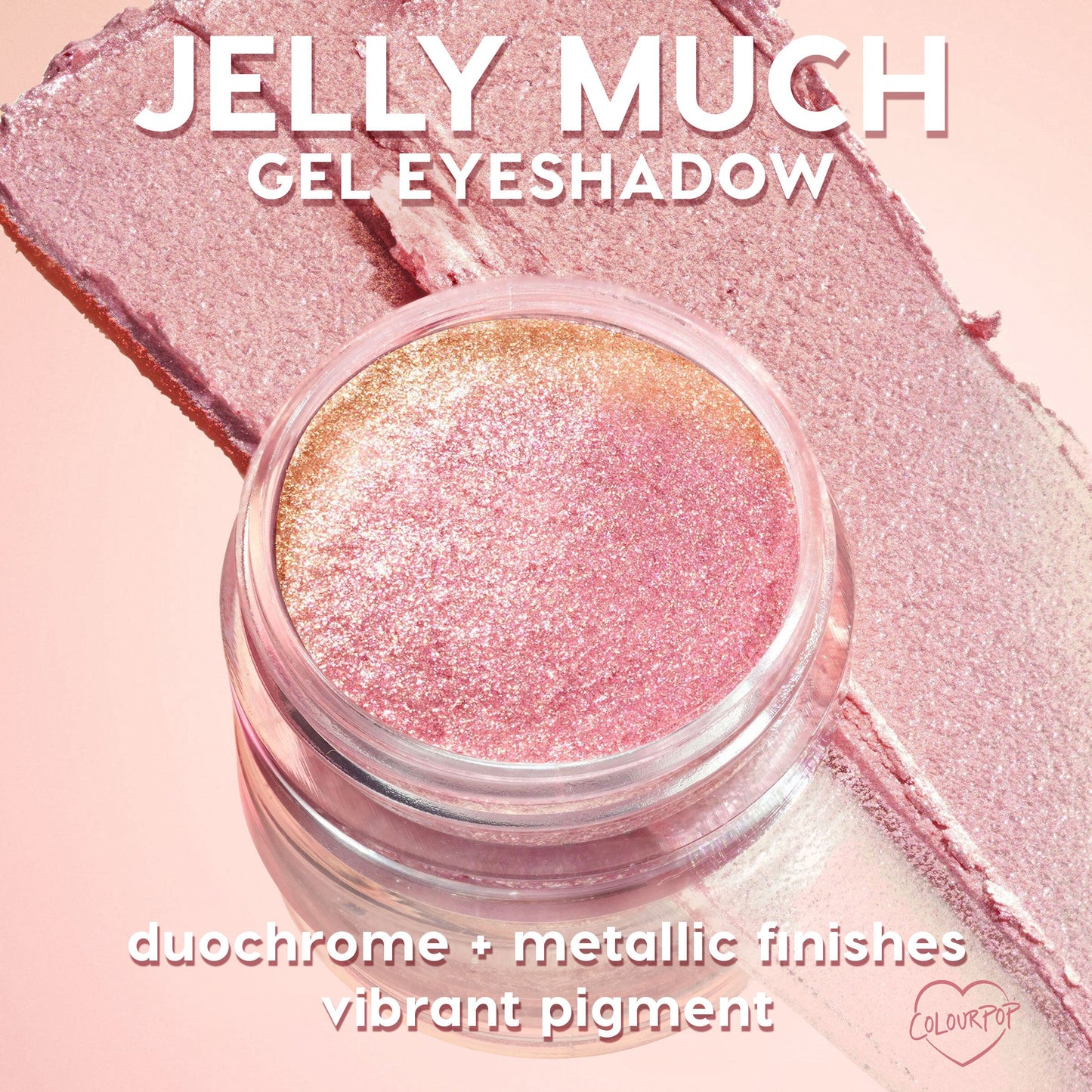 ColourPop Jelly Much Shadow Close To You shown open in a clear pot, sparkling pink-to-gold duochrome gel as it catches light, resting on wide pink swatches that showcase its metallic finish and vibrant pigment.